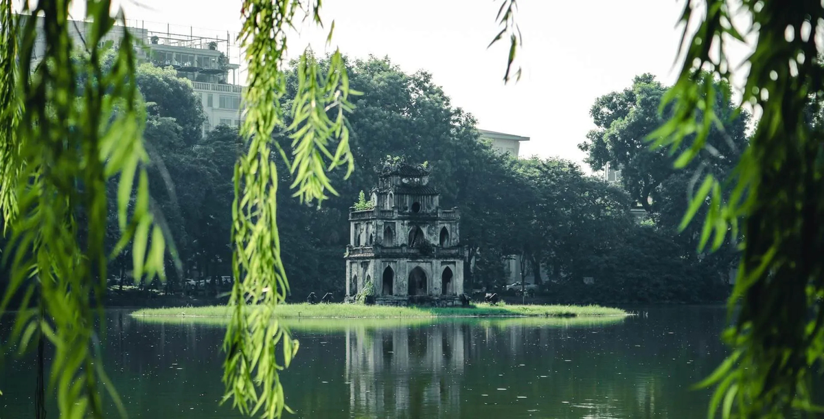 Nestled in the middle of Hoan Kiem Lake, Turtle Tower stands as a quiet sentinel of Vietnam’s capital